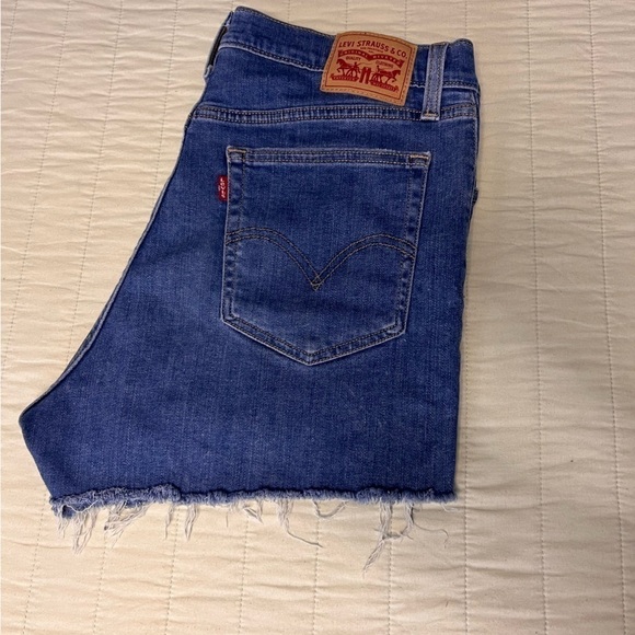Levi's Pants - Women’s distressed  Levi’s high rise denim shorts size 32